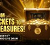 Jumbo Ticket Grand Live Draw - From Tickets to Treasures! A treasure chest filled with gold coins and a ticket on a grand stage background.