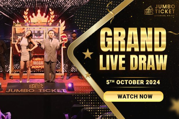 Hosts presenting the Jumbo Ticket Grand Live Draw on stage, with a "Grand Live Draw" banner and the date, October 5, 2024.